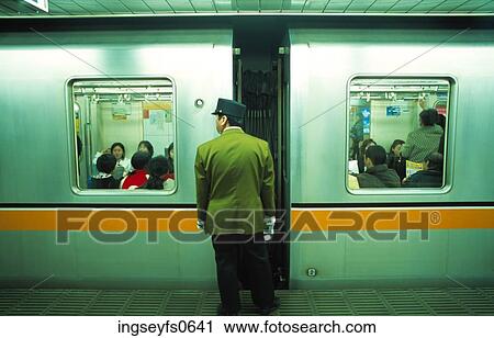 Train Attendant in Japan View Large Photo Image Stock Image - Train Attendant in Japan. Fotosearch