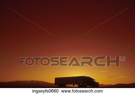 Truck Driving at Sunset View Large Photo Image Stock Image - Truck Driving at Sunset. Fotosearch