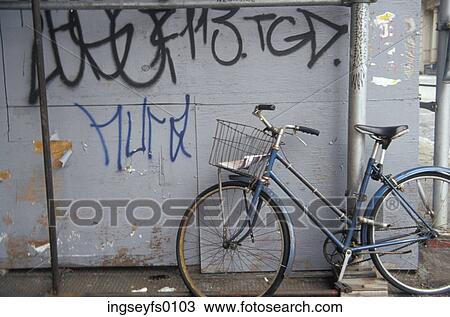 Vintage Bicycle Leaning Against Wall With Graffiti View Large Photo Image Stock Image - Vintage Bicycle Leaning Against Wall With Graffiti. Fotosearch