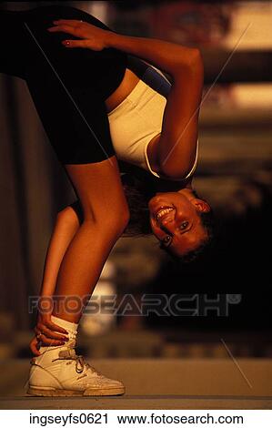 Woman Athlete Stretching View Large Photo Image Stock Image - Woman Athlete Stretching. Fotosearch