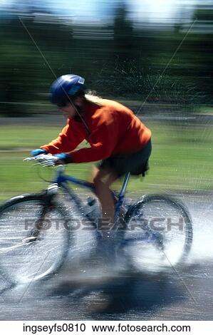Woman Biking View Large Photo Image Stock Image - Woman Biking. Fotosearch