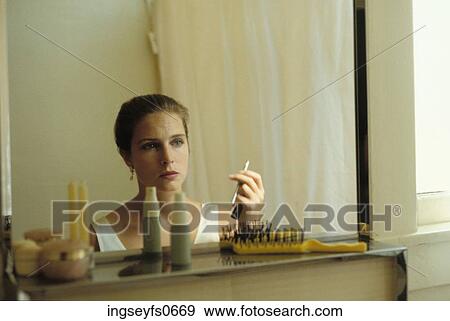 Woman Looking at Herself in Mirror View Large Photo Image Stock Photo - Woman Looking at Herself in Mirror. Fotosearch