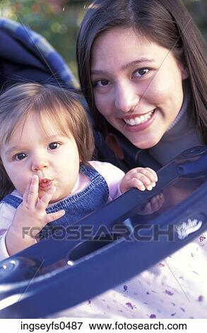 Woman Posing with Baby Girl View Large Photo Image Stock Photo - Woman Posing with Baby Girl. Fotosearch