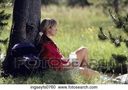 Woman Resting Against Tree View Large Photo Image Stock Image - Woman Resting Against Tree. Fotosearch