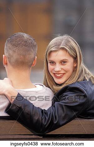 Woman Smiling With Her Arm Around Man View Large Photo Image Stock Photo - Woman Smiling With Her Arm Around Man. Fotosearch