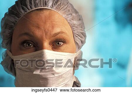 Woman Wearing Scrubs and a Face Mask View Large Photo Image Stock Photo - Woman Wearing Scrubs and a Face Mask. Fotosearch