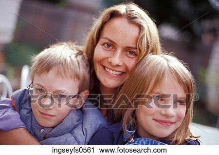Woman With Two Children View Large Photo Image Stock Image - Woman With Two Children. Fotosearch