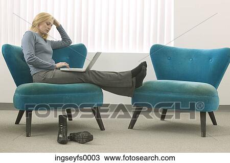 Stock Image - Woman Working with Laptop. Fotosearch