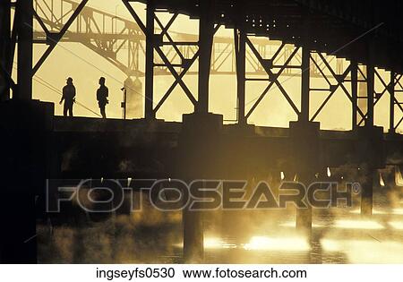 Workers Standing Underneath Bridge View Large Photo Image Stock Image - Workers Standing Underneath Bridge. Fotosearch