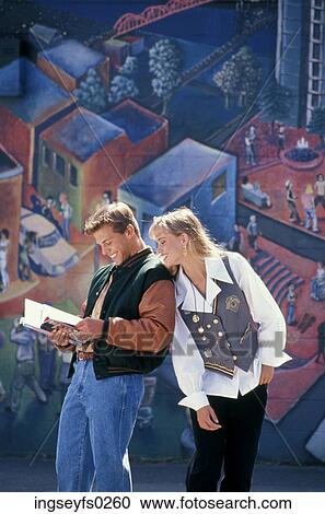 Young Couple Standing In Front Of Mural View Large Photo Image Stock Image - Young Couple Standing In Front Of Mural. Fotosearch