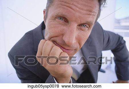 Close-up of a businessman View Large Photo Image Stock Photo - Close-up of a businessman. Fotosearch