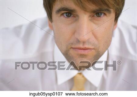 Close-up of a businessman View Large Photo Image Stock Photo - Close-up of a businessman. Fotosearch