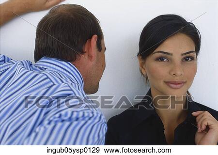Close-up of a young man leaning next to a young woman View Large Photo Image Stock Photo - Close-up of a young man leaning next to a young woman. Fotosearch