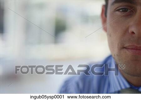 Stock Image - Close-up of a young man's face. Fotosearch