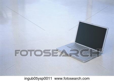 Stock Image - Laptop on the floor. Fotosearch