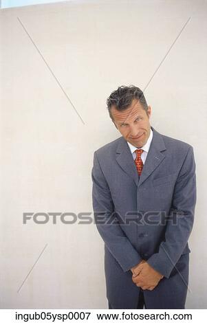 Stock Photo - Portrait of a businessman smiling. Fotosearch