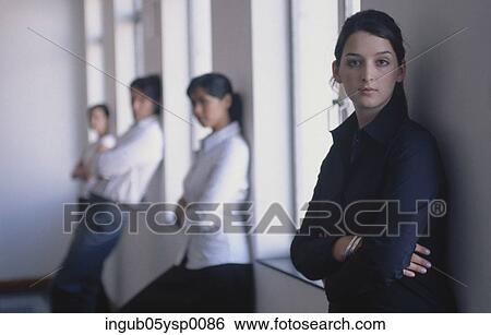 Portrait of a group of people standing in a row View Large Photo Image Stock Photograph - Portrait of a group of people standing in a row. Fotosearch