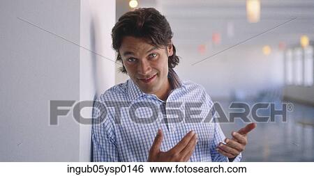 Portrait of a young man View Large Photo Image Stock Photograph - Portrait of a young man. Fotosearch