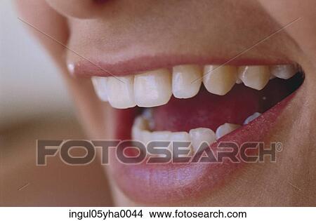 Close-up of a person smiling View Large Photo Image Picture - Close-up of a person smiling. Fotosearch