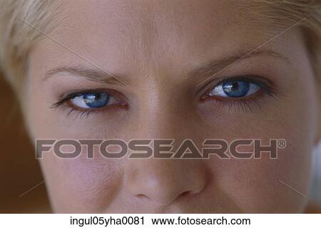 Close-up of a young woman's face View Large Photo Image Stock Image - Close-up of a young woman's face. Fotosearch