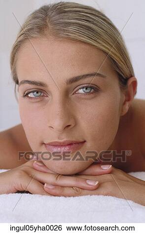 Stock Photograph - Close-up of a young woman's face. Fotosearch