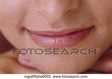 Close-up of a young woman's lips View Large Photo Image Stock Image - Close-up of a young woman's lips. Fotosearch