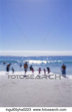 Group of people on the beach View Large Photo Image Stock Image - Group of people on the beach. Fotosearch