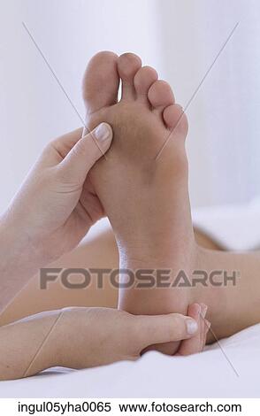 Person getting a foot massage View Large Photo Image Stock Photography - Person getting a foot massage. Fotosearch