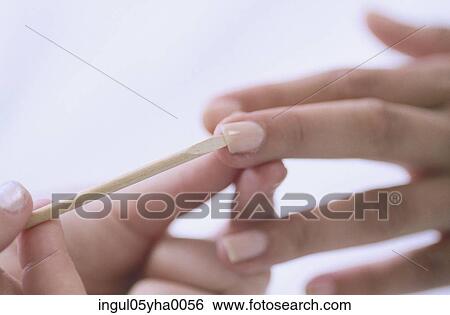 Person getting a manicure View Large Photo Image Stock Photograph - Person getting a manicure. Fotosearch
