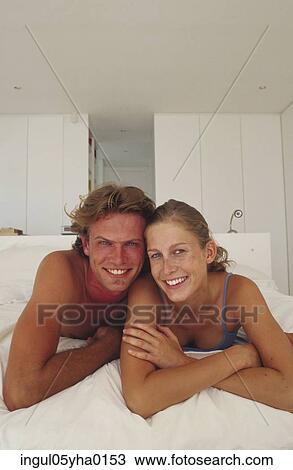 Stock Image - Portrait of a young couple. Fotosearch