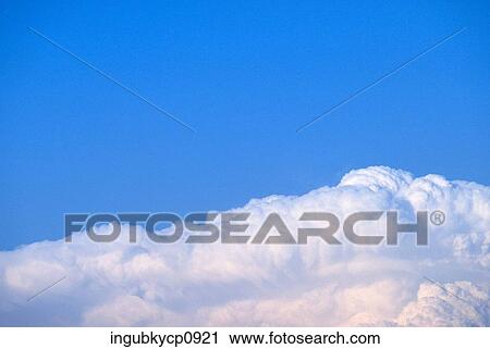 Stock Image - Aerial view of clouds in the sky. Fotosearch