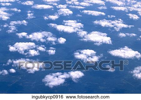 Aerial view of clouds in the sky View Large Photo Image Stock Photograph - Aerial view of clouds in the sky. Fotosearch