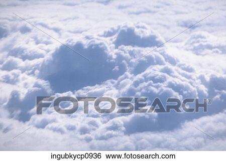 Stock Photograph - Aerial view of clouds in the sky. Fotosearch