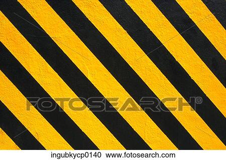 Close-up of a black and yellow striped surface View Large Photo Image Stock Image - Close-up of a black and yellow striped surface. Fotosearch