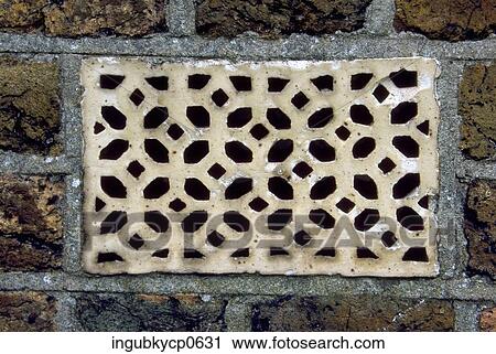 Close-up of a cement grill in a window View Large Photo Image Stock Image - Close-up of a cement grill in a window. Fotosearch