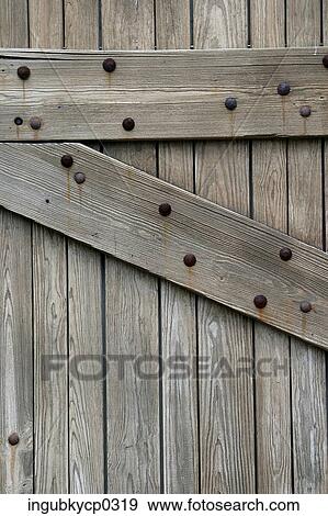 Close-up of a door of wooden planks View Large Photo Image Stock Photo - Close-up of a door of wooden planks. Fotosearch