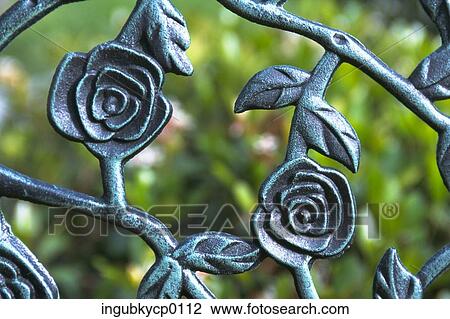 Close-up of a floral pattern on a metal grill View Large Photo Image Stock Image - Close-up of a floral pattern on a metal grill. Fotosearch