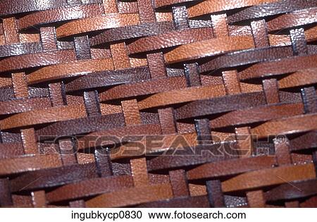 Close-up of a leather woven basket View Large Photo Image Stock Image - Close-up of a leather woven basket. Fotosearch