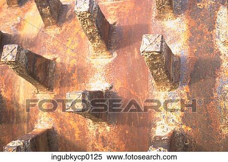 Close-up of a metal panel with square spokes View Large Photo Image Stock Photography - Close-up of a metal panel with square spokes. Fotosearch