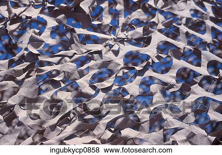 Stock Photo - Close-up of a pattern cut out of paper. Fotosearch