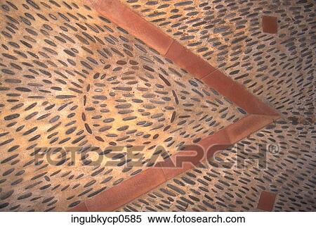 Stock Photography - Close-up of a pattern embedded in a wall. Fotosearch