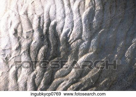 Close-up of a pattern on a concrete surface View Large Photo Image Stock Photo - Close-up of a pattern on a concrete surface. Fotosearch