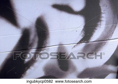 Stock Image - Close-up of a pattern painted on a wall. Fotosearch