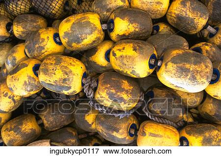 Stock Photo - Close-up of a pile of fishing floaters. Fotosearch