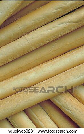 Close-up of a pile of French baguettes View Large Photo Image Stock Image - Close-up of a pile of French baguettes. Fotosearch