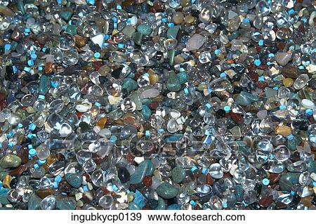 Close-up of a pile of shiny stones View Large Photo Image Stock Photo - Close-up of a pile of shiny stones. Fotosearch