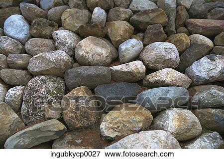 Stock Photo - Close-up of a pile of weathered stones. Fotosearch