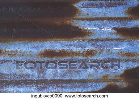 Stock Image - Close-up of a rusted metal shutter. Fotosearch