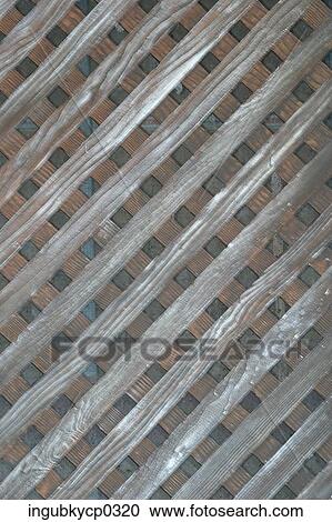 Close-up of a striped wooden fence View Large Photo Image Stock Image - Close-up of a striped wooden fence. Fotosearch