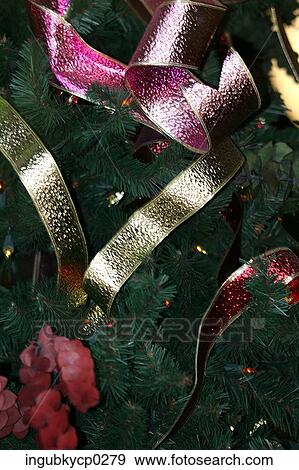 Close-up of an artificial Christmas tree View Large Photo Image Stock Photo - Close-up of an artificial Christmas tree. Fotosearch